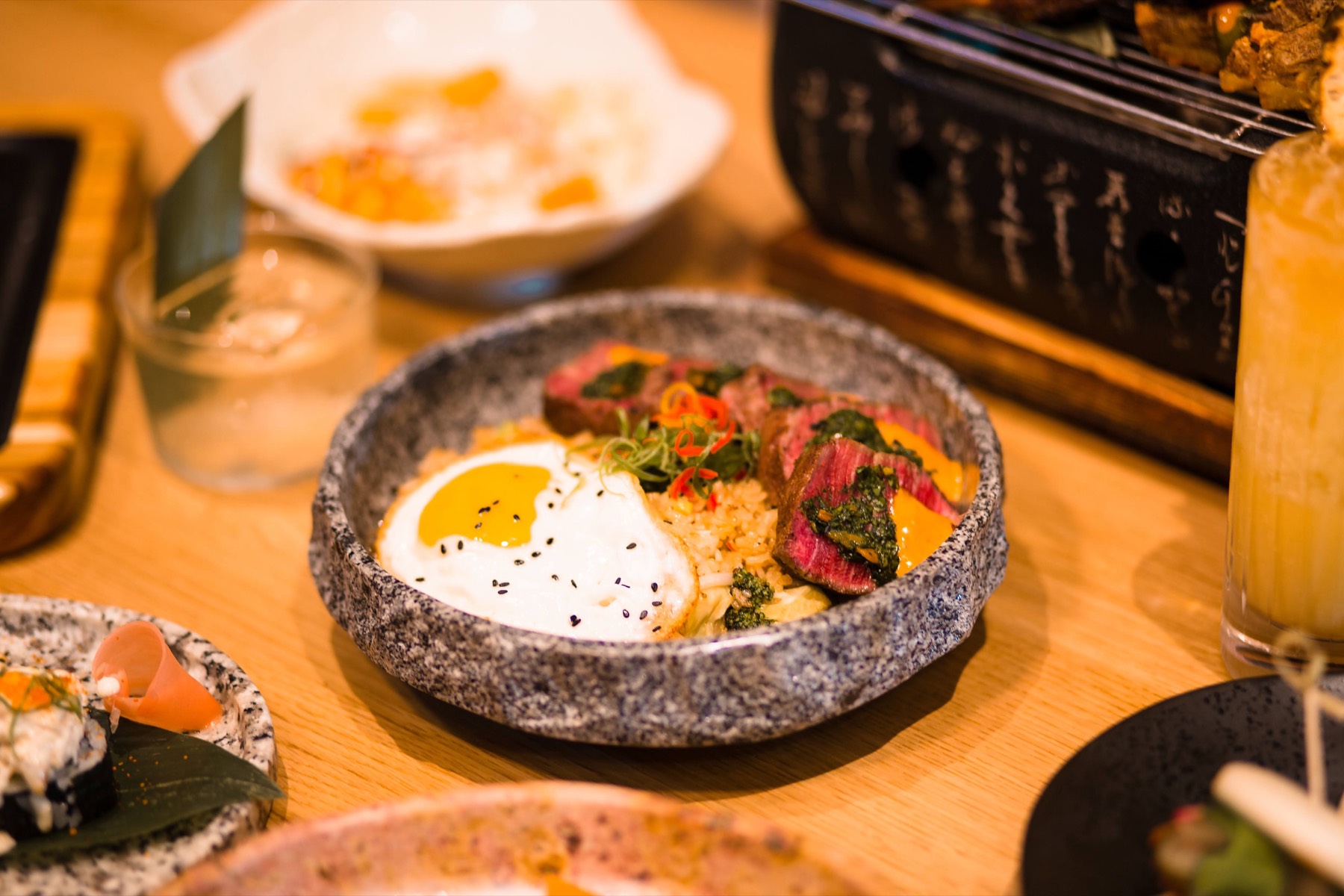 Steak fried rice topped with seared wagyu, chimichurri and a fried egg